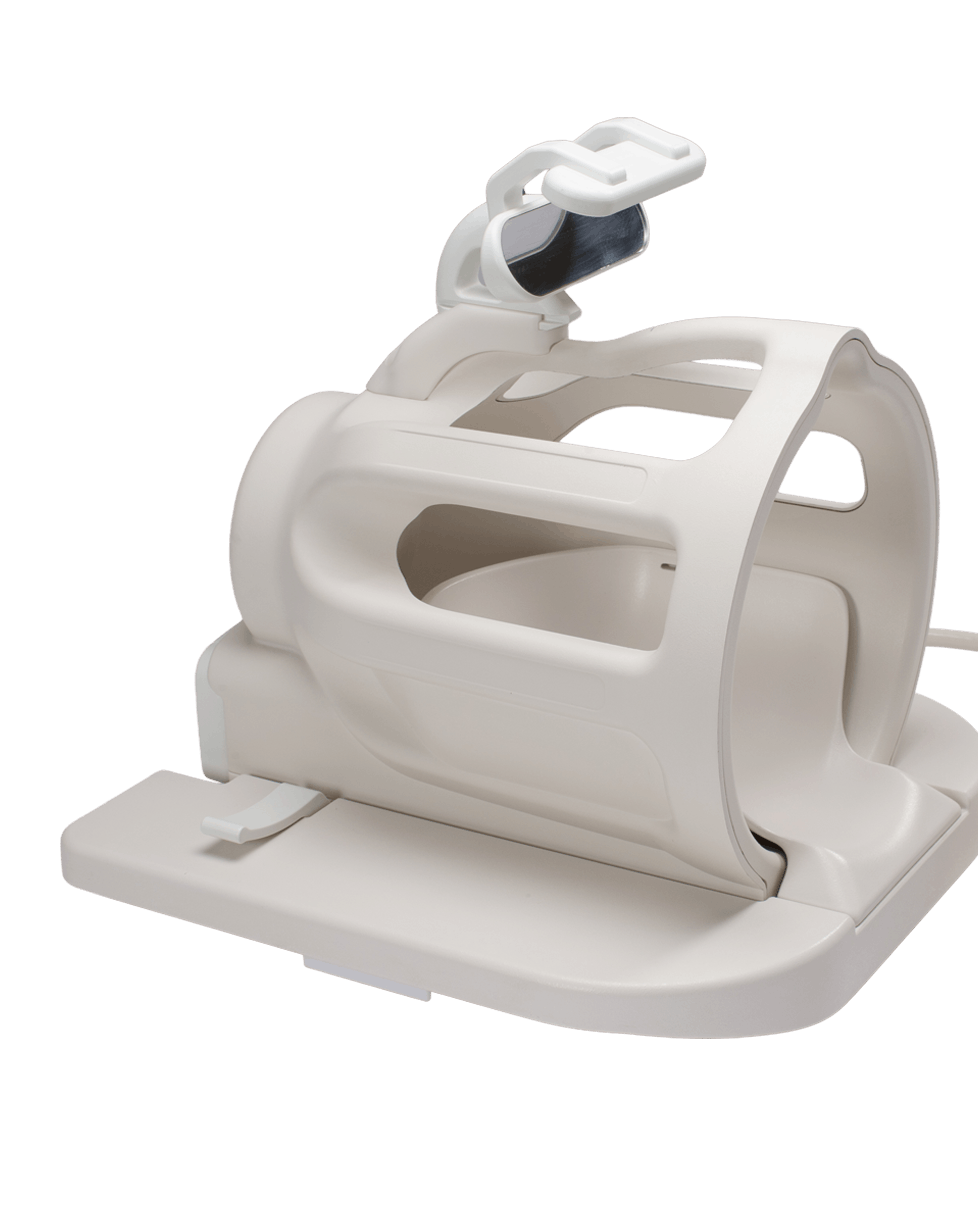 White medical positioning device with a curved frame and base, used to stabilize a limb during therapy or imaging