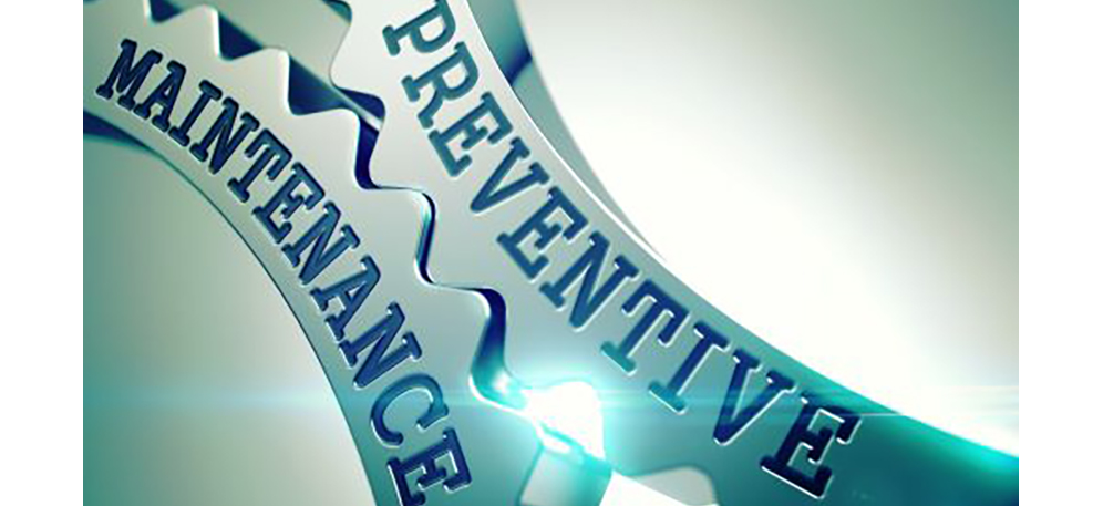 Two interlocking metal gears labeled 'Maintenance' and 'Preventive' symbolizing proactive maintenance.